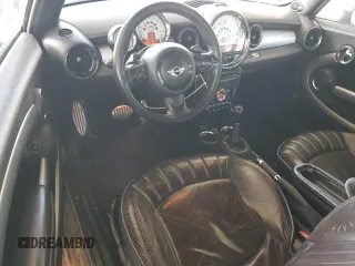 2014 MINI Convertible S with VIN WMWZP3C55ET706573, listed as a Copart auction lot 52325705 with 125,076 mi miles and Salvage Title. Bid and sale history available at DreamBid. Image 8.