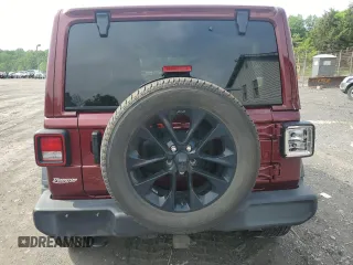 2021 Jeep Wrangler Unlimited Sport S with VIN 1C4HJXDGXMW785601, listed as a Copart auction lot 57342445 with 57,147 mi miles and Salvage title. Bid and sale history available at DreamBid. Image 6.