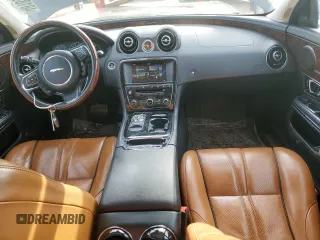2016 Jaguar XJ R-Sport с VIN SAJWJ1CDXG8W03448, выставлен на аукционе Copart как лот 48188865 с пробегом 65 356 миль миль и Списание • Salvage title. История ставок и продаж доступна на DreamBid. Изображение 8.