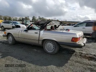 1986 Mercedes-Benz 560 SL with VIN WDBBA48D1GA040918, listed as a Copart auction lot 79708704 with 121,310 mi miles and Salvage Title. Bid and sale history available at DreamBid. Image 2.