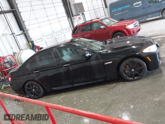 2013 BMW 5 Series 550i xDrive with VIN WBAFU9C56DDY70471, listed as a IAAI auction lot 42158400 with 100,251 mi miles and . Bid and sale history available at carsss.com. Image 13.
