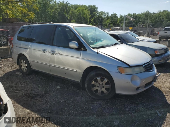 2003 Honda Odyssey EX-L z VIN 5FNRL18903B007639, wystawiony jako Copart lot #57230975 z przebiegiem 189 235 mil mil oraz Szkoda całkowita • Salvage title. Historia ofert i sprzedaży dostępna na DreamBid. Obrazek 4.