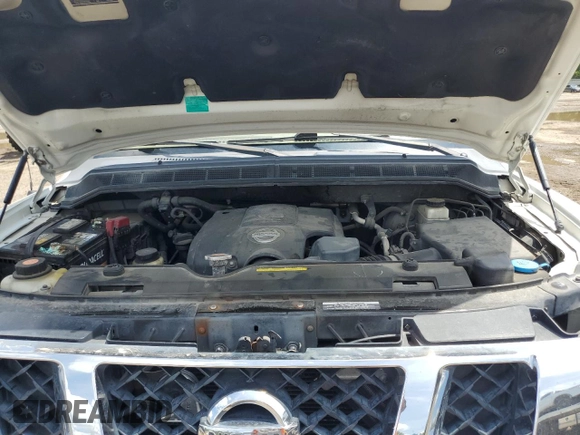 2010 Nissan Titan SE with VIN 1N6BA0ED1AN323167, listed as a Copart auction lot 60237535 with 135,182 mi miles and Salvage title. Bid and sale history available at DreamBid. Image 11.