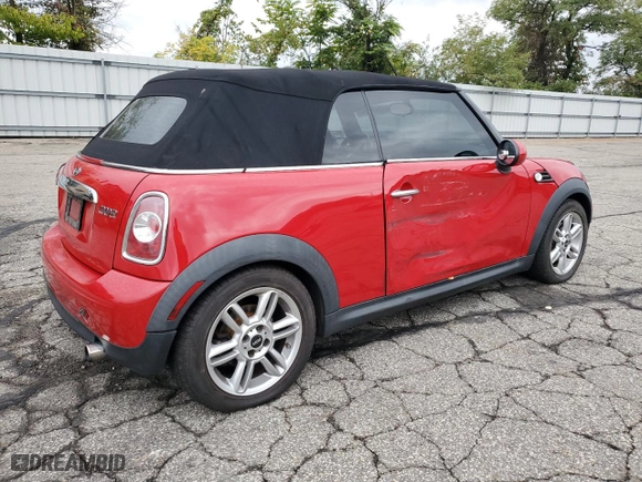 2011 MINI Cooper Convertible with VIN WMWZN3C51BTZ78331, listed as a Copart auction lot 73348304 with 94,219 mi miles and Salvage Title. Bid and sale history available at carsss.com. Image 3.