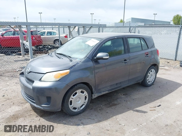 2010 Scion xD with VIN JTKKU4B42A1001367, listed as a IAAI auction lot 42085217 with 120,359 mi miles. Bid and sale history available at carsss.com. Image 2.
