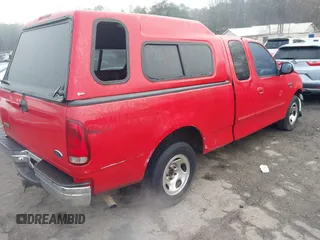 1999 Ford F-150 z VIN 1FTRX17WXXNA90516, wystawiony jako IAAI lot #41787426 z przebiegiem 354 066 mil mil oraz . Historia ofert i sprzedaży dostępna na DreamBid. Obrazek 4.