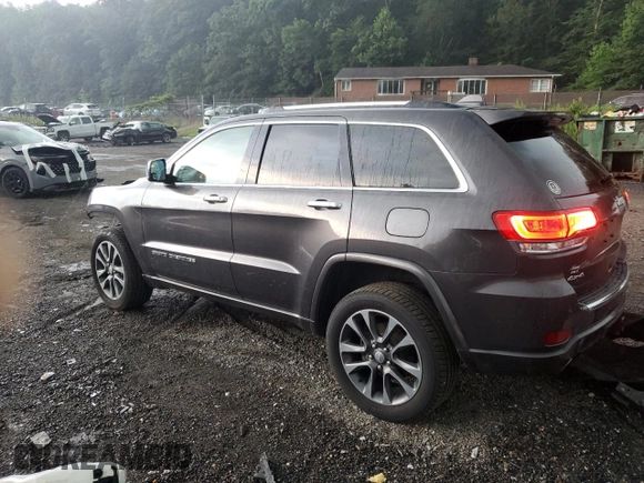 2017 Jeep Grand Cherokee Overland with VIN 1C4RJFCG4HC730861, listed as a Copart auction lot 62918825 with 77,228 mi miles and Salvage title. Bid and sale history available at DreamBid. Image 2.