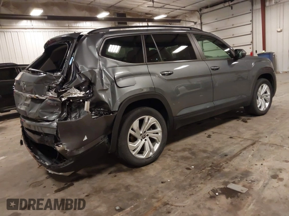 2021 Volkswagen Atlas SE z VIN 1V2KR2CA5MC606590, wystawiony jako IAAI lot #42383813 z przebiegiem 45 087 mil mil oraz . Historia ofert i sprzedaży dostępna na DreamBid. Obrazek 4.