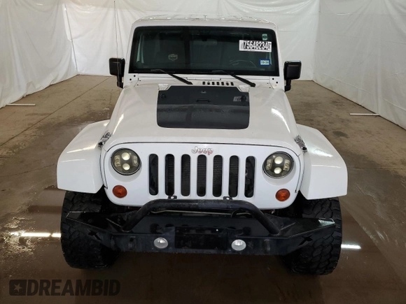 2012 Jeep Wrangler Arctic with VIN 1C4AJWBG4CL146788, listed as a Copart auction lot 75648234 with 100,879 mi miles and Clean title. Bid and sale history available at DreamBid. Image 5.
