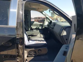 2005 Ford F-150 XLT with VIN 1FTRW12W85KC74796, listed as a IAAI auction lot 41761901 with 235,009 mi miles. Bid and sale history available at carsss.com. Image 5.