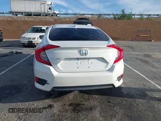 2017 Honda Civic EX z VIN 2HGFC2F76HH573639, wystawiony jako IAAI lot #41807311 z przebiegiem 140 431 mil mil oraz . Historia ofert i sprzedaży dostępna na DreamBid. Obrazek 16.