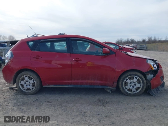 2009 Pontiac Vibe z VIN 5Y2SM67099Z420029, wystawiony jako IAAI lot #41819986 z przebiegiem 140 108 mil mil oraz . Historia ofert i sprzedaży dostępna na DreamBid. Obrazek 14.