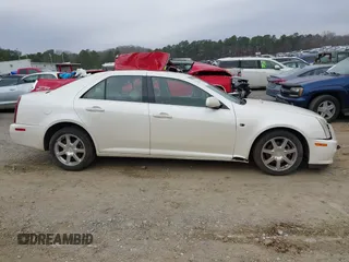 2005 Cadillac STS z VIN 1G6DW677250198015, wystawiony jako IAAI lot #41543304 z przebiegiem 160 000 mil mil oraz . Historia ofert i sprzedaży dostępna na DreamBid. Obrazek 13.