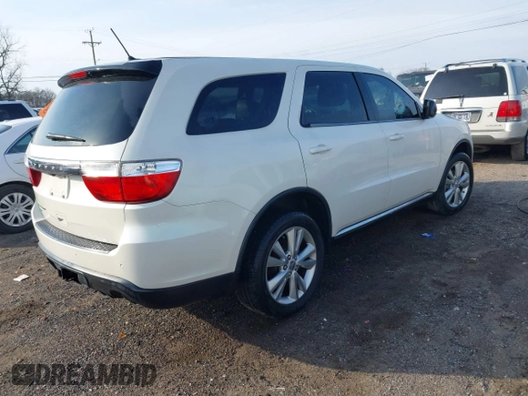 2012 Dodge Durango SXT with VIN 1C4RDHAG6CC335790, listed as a IAAI auction lot 41605378 with 204,306 mi miles and . Bid and sale history available at DreamBid. Image 4.