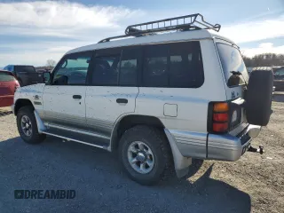 1999 Mitsubishi Montero z VIN JA4MR51R9XJ007139, wystawiony jako Copart lot #41682545 z przebiegiem 200 002 mil mil oraz Czysty tytuł • Clean title. Historia ofert i sprzedaży dostępna na DreamBid. Obrazek 2.