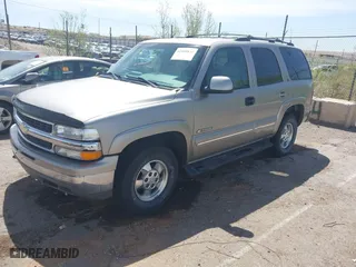 2000 Chevrolet New Tahoe LT with VIN 1GNEK13T7YJ185916, listed as a IAAI auction lot 42109831 with 205,165 mi miles. Bid and sale history available at carsss.com. Image 2.