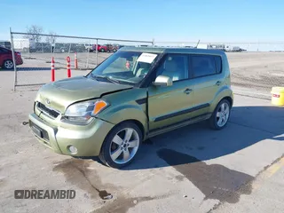 2011 Kia Soul + with VIN KNDJT2A2XB7281113, listed as a IAAI auction lot 41869852 with 155,095 mi miles. Bid and sale history available at carsss.com. Image 2.