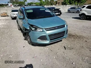 2013 Ford Escape SE z VIN 1FMCU0GX8DUA92814, wystawiony jako Copart lot #61564665 z przebiegiem 110 854 mil mil oraz Szkoda całkowita • Salvage title. Historia ofert i sprzedaży dostępna na DreamBid. Obrazek 13.