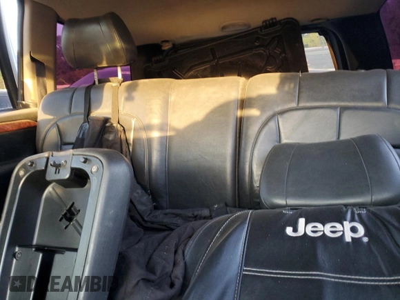2004 Jeep Grand Cherokee with VIN 1J8GX58J54C284761, listed as a Copart auction lot 75614854 with 182,188 mi miles and Salvage title. Bid and sale history available at DreamBid. Image 10.