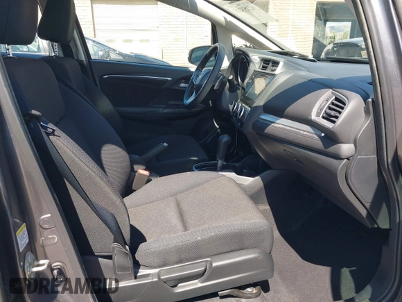 2015 Honda Fit EX-L z VIN 3HGGK5H86FM746265, wystawiony jako IAAI lot #42253205 z przebiegiem 75 491 mil mil oraz . Historia ofert i sprzedaży dostępna na DreamBid. Obrazek 5.