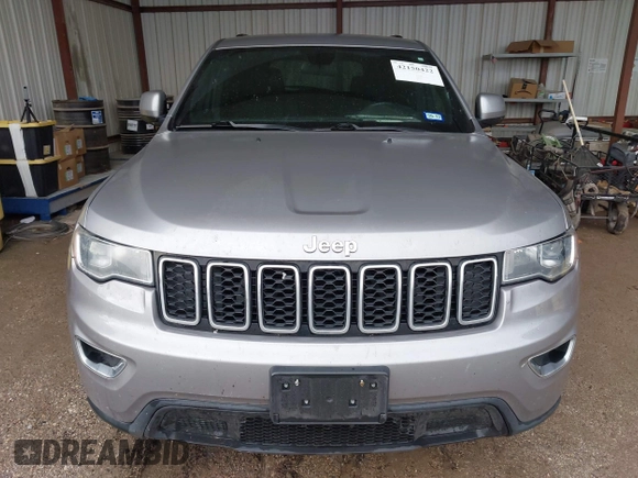 2018 Jeep Grand Cherokee Laredo E with VIN 1C4RJEAG1JC275356, listed as a IAAI auction lot 42150422 with 69,720 mi miles and . Bid and sale history available at DreamBid. Image 12.