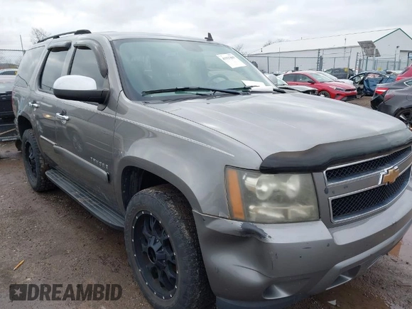 2007 Chevrolet Tahoe LT with VIN 1GNFC13077J278764, listed as a IAAI auction lot 41927809 with 211,943 mi miles and . Bid and sale history available at DreamBid. Image 1.