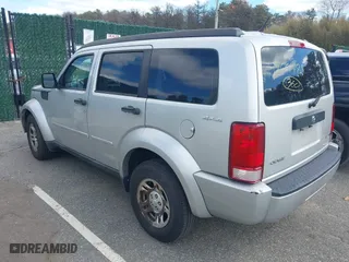 2011 Dodge Nitro SE with VIN 1D4PU2GKXBW508467, listed as a IAAI auction lot 42061484 with 100,295 mi miles. Bid and sale history available at carsss.com. Image 3.