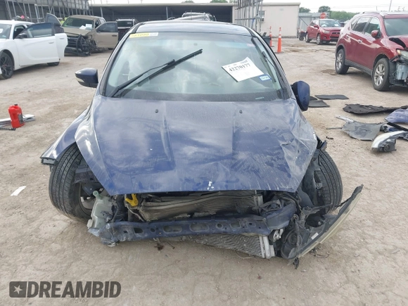 2016 Ford Focus Titanium with VIN 1FADP3J21GL404602, listed as a IAAI auction lot 42270177 with 118,369 mi miles and . Bid and sale history available at DreamBid. Image 13.