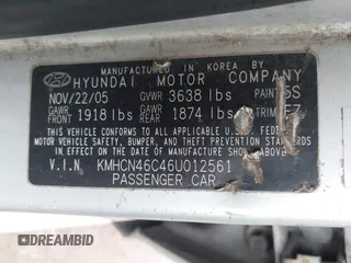 2006 Hyundai Accent GLS with VIN KMHCN46C46U012561, listed as a IAAI auction lot 41750609 with 286,770 mi miles. Bid and sale history available at carsss.com. Image 9.