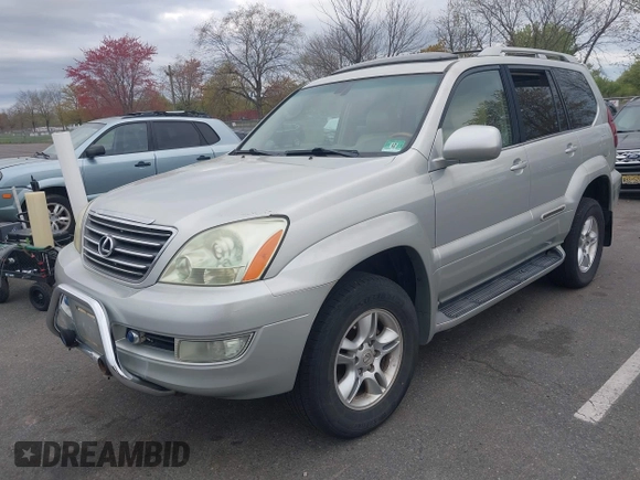 2004 Lexus GX with VIN JTJBT20X240063922, listed as a IAAI auction lot 42087170 with 251,366 mi miles. Bid and sale history available at carsss.com. Image 17.