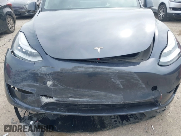 2023 Tesla Model Y Long Range with VIN 7SAYGDEE0PA036048, listed as a IAAI auction lot 41775845 with 41,291 mi miles. Bid and sale history available at carsss.com. Image 6.