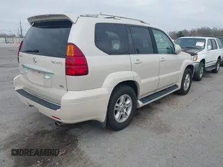2003 Lexus GX 470 with VIN JTJBT20X630011479, listed as a IAAI auction lot 41556491 with 310,198 mi miles and . Bid and sale history available at DreamBid. Image 4.