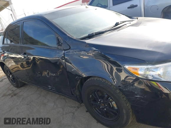 2009 Toyota Corolla with VIN 1NXBU40E19Z128054, listed as a IAAI auction lot 42085620 with 109,702 mi miles. Bid and sale history available at carsss.com. Image 6.