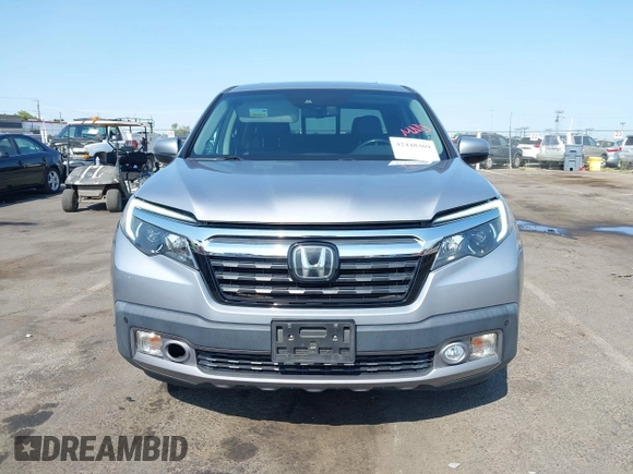 2019 Honda Ridgeline RTL-E with VIN 5FPYK3F79KB029771, listed as a IAAI auction lot 42448369 with 90,142 mi miles and . Bid and sale history available at DreamBid. Image 12.