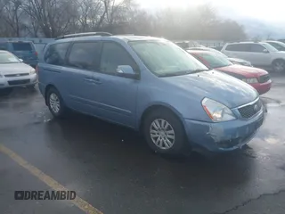 2014 Kia Sedona LX with VIN KNDMG4C79E6547589, listed as a IAAI auction lot 41724633 with 211,213 mi miles. Bid and sale history available at carsss.com. Image 1.