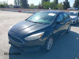 2015 Ford Focus SE with VIN 1FADP3F23FL313614, listed as a IAAI auction lot 42153320 with 121,346 mi miles. Bid and sale history available at carsss.com. Image 6.