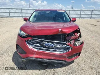 2020 Ford Edge SEL с VIN 2FMPK4J96LBA06946, выставлен на аукционе Copart как лот 56898855 с пробегом 54 984 миль миль и Списание • Salvage title. История ставок и продаж доступна на DreamBid. Изображение 5.