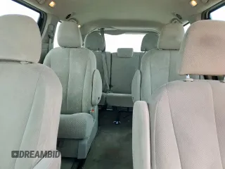 2014 Toyota Sienna L with VIN 5TDZK3DC9ES504168, listed as a Copart auction lot 53580095 with 253,688 mi miles and Salvage Title. Bid and sale history available at carsss.com. Image 10.