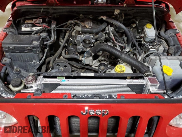 2009 Jeep Wrangler X с VIN 1J4FA24179L734789, выставлен на аукционе Copart как лот 54131245 с пробегом 98 239 миль миль и Списание • Salvage title. История ставок и продаж доступна на DreamBid. Изображение 11.
