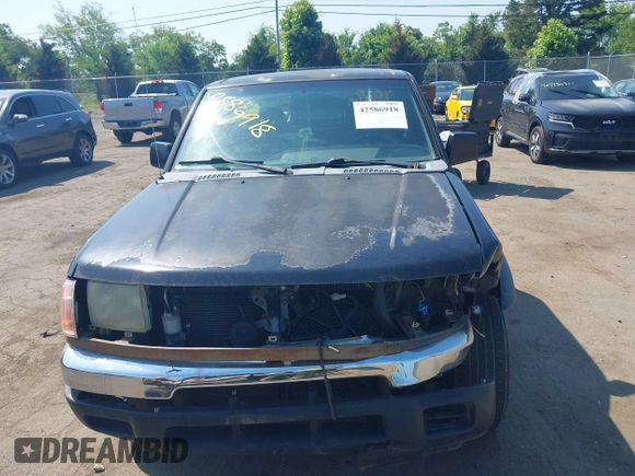 1999 Nissan Frontier XE with VIN 1N6ED26Y4XC315134, listed as a IAAI auction lot 42586918 with 216,939 mi miles and . Bid and sale history available at DreamBid. Image 12.