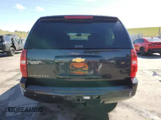 2013 Chevrolet Suburban LT with VIN 1GNSKJE70DR138631, listed as a Copart auction lot 57778185 with 176,934 mi miles and Salvage title. Bid and sale history available at DreamBid. Image 6.
