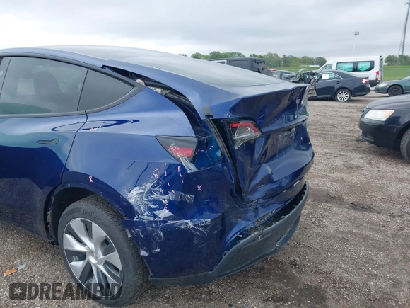 2023 Tesla Model Y Long Range z VIN 7SAYGDEE0PF840787, wystawiony jako IAAI lot #42172489 z przebiegiem 16 314 mil mil oraz . Historia ofert i sprzedaży dostępna na DreamBid. Obrazek 20.