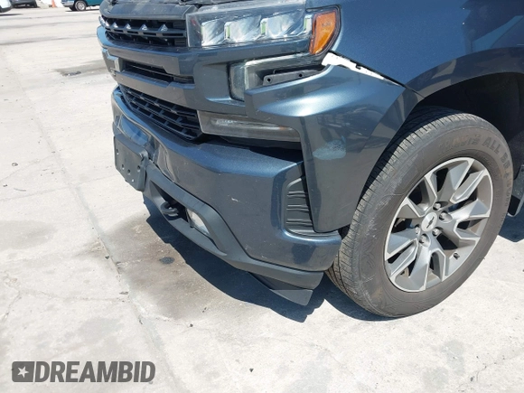 2021 Chevrolet Silverado 1500 RST with VIN 1GCPYEEK3MZ386123, listed as a IAAI auction lot 42020558 with 79,269 mi miles and . Bid and sale history available at DreamBid. Image 6.
