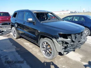 2021 Jeep Grand Cherokee 80th Anniversary with VIN 1C4RJFBG9MC745643, listed as a IAAI auction lot 41729989 with 88,567 mi miles and . Bid and sale history available at DreamBid. Image 1.