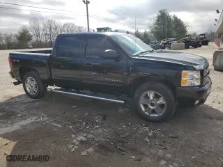 2013 Chevrolet Silverado 1500 LTZ with VIN 3GCPKTE75DG281052, listed as a Copart auction lot 43200265 with 176,129 mi miles and Salvage Title. Bid and sale history available at carsss.com. Image 4.
