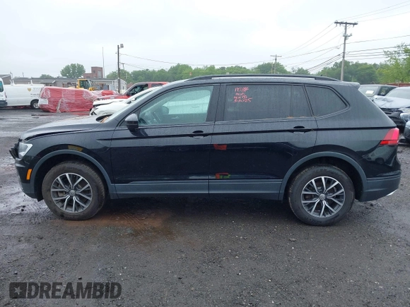 2021 Volkswagen Tiguan S z VIN 3VV0B7AX3MM031908, wystawiony jako IAAI lot #42504384 z przebiegiem 42 510 mil mil oraz . Historia ofert i sprzedaży dostępna na DreamBid. Obrazek 14.