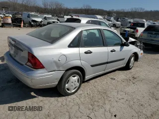 2003 Ford Focus LX с VIN 1FAFP33P63W187283, выставлен на аукционе Copart как лот 48803575 с пробегом Не указан миль и Списание • Salvage title. История ставок и продаж доступна на DreamBid. Изображение 3.