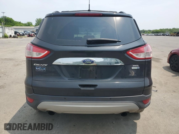2013 Ford Escape SEL z VIN 1FMCU9H94DUD47723, wystawiony jako Copart lot #59765595 z przebiegiem 129 551 mil mil oraz Szkoda całkowita • Salvage title. Historia ofert i sprzedaży dostępna na DreamBid. Obrazek 6.