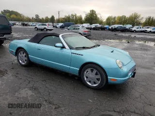 2002 Ford Thunderbird Hardtop Premium with VIN 1FAHP60A02Y121714, listed as a Copart auction lot 77852994 with 132,049 mi miles and Salvage Title. Bid and sale history available at DreamBid. Image 4.