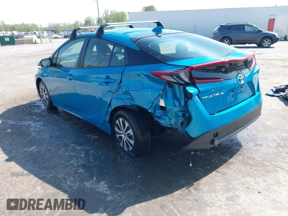 2021 Toyota Prius LE with VIN JTDKAMFP7M3180504, listed as a IAAI auction lot 41985409 with 56,617 mi miles and . Bid and sale history available at DreamBid. Image 3.